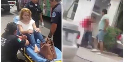 Joven mujer se golpea la cabeza contra un muro