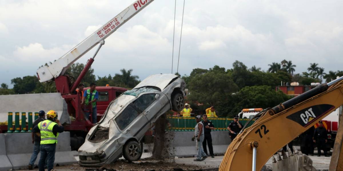 Familiares de muertos por socavón en Paso Exprés aceptan indemnización Familiares de muertos por socavón en Paso Exprés aceptan indemnización