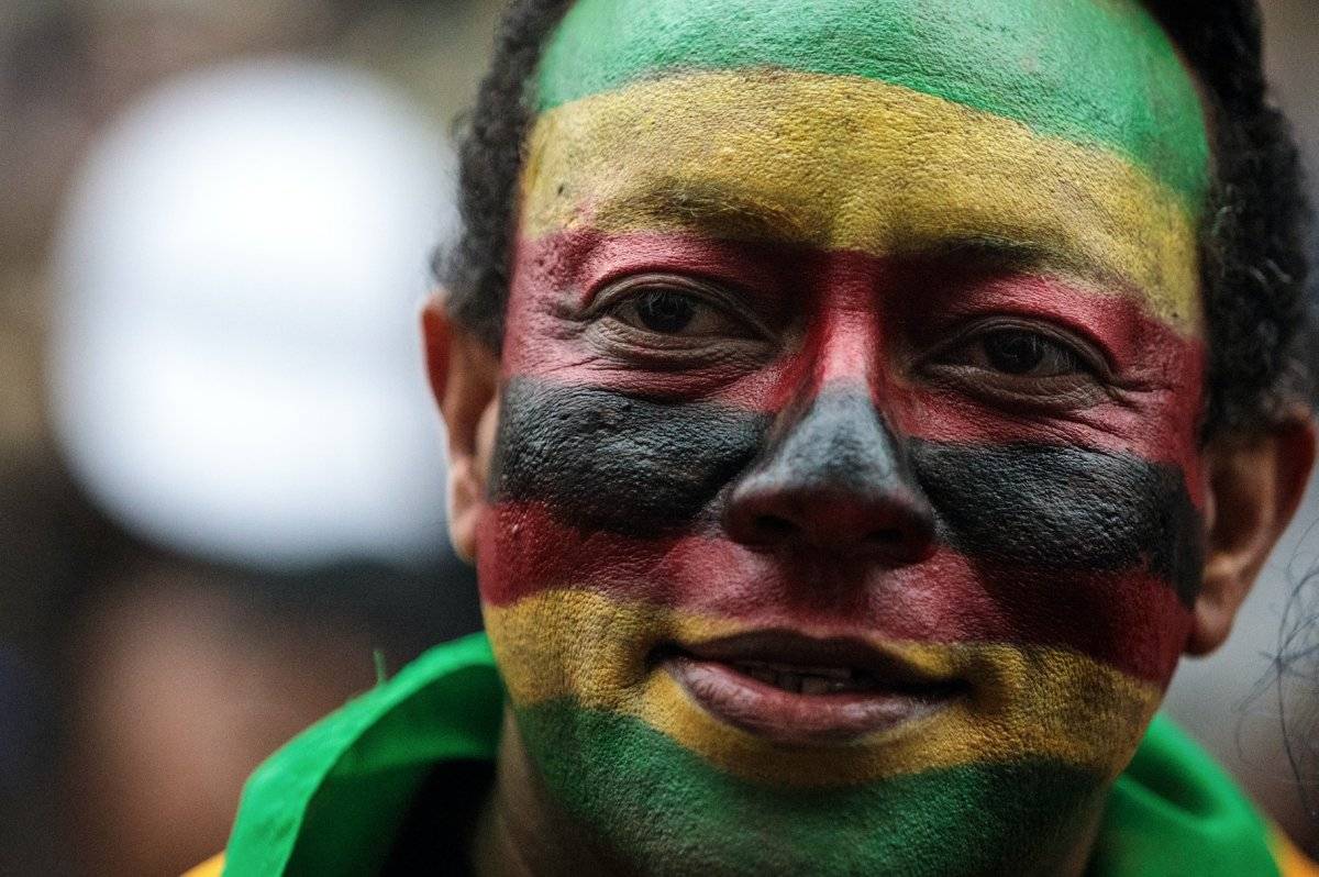 Zimbabuense en Londres, pidiendo la salida de Mugabe.