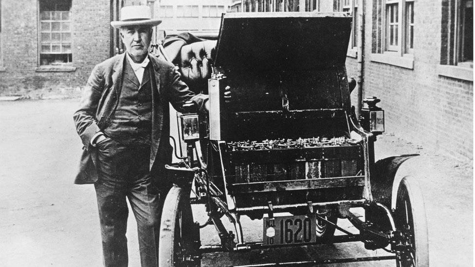 99333692americaninventorandphysicistthomasedison1895withhisfirstelectriccartheedisonbakerheisholdingoneofthebatteriesusedtopowerthevehiclephotobygeneralphotographicagencygettyi-56ed611e957ffd100386804d87f0d4c6.jpg