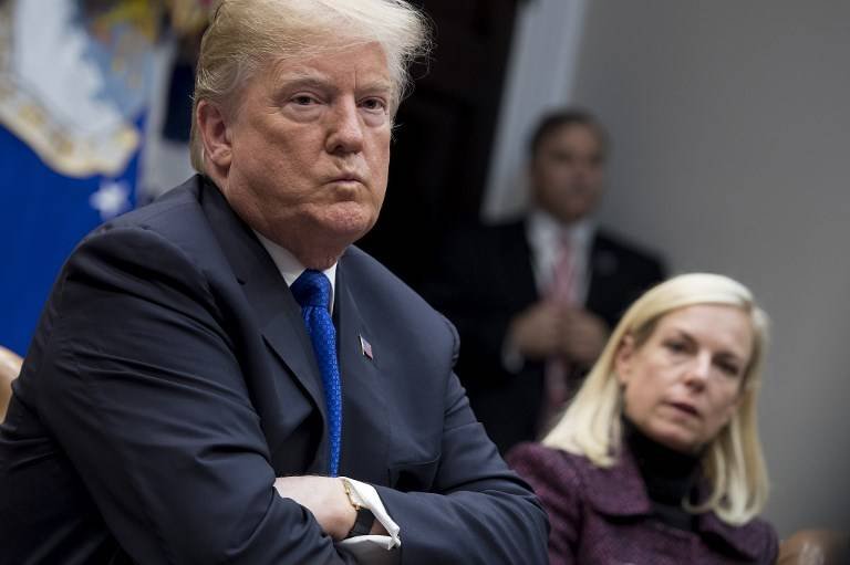 Donald Trump y Kirstjen Nielsen