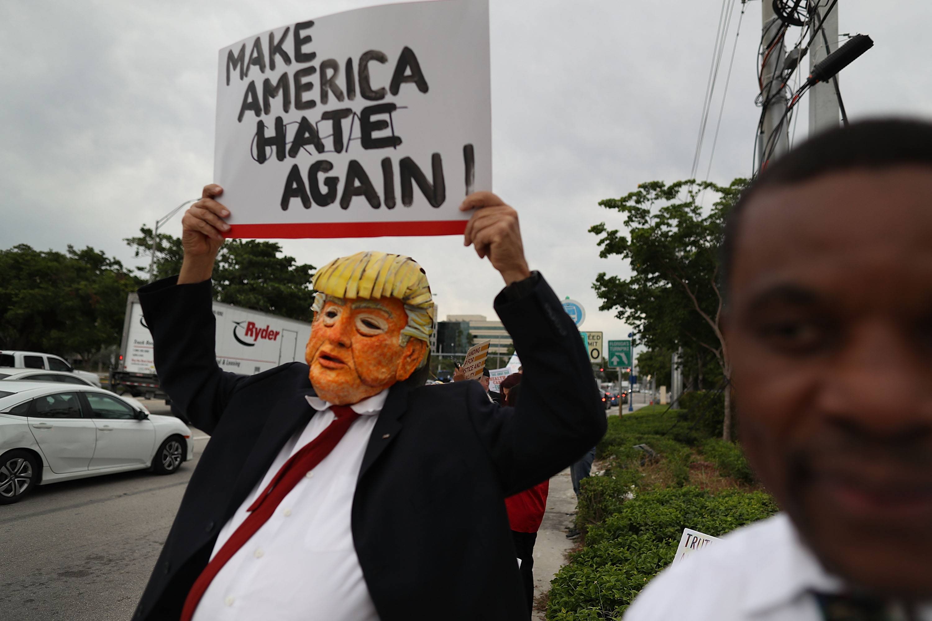 Protestors Rally Against Senate Tax Plan At Marco Rubio South Florida Office