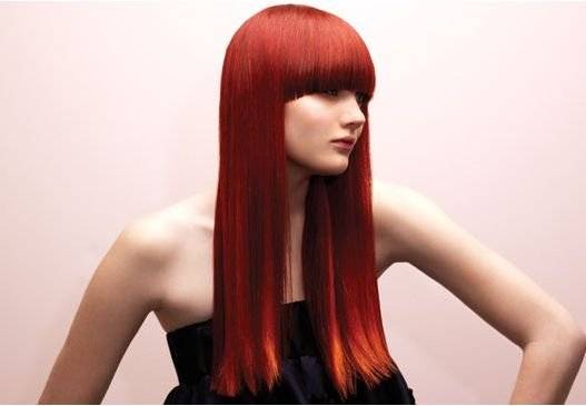 verylongmodernwomanhairstylewithlongbangstraighthairinred.jpg