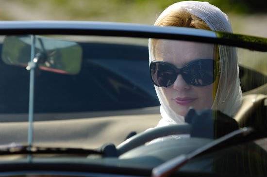 womancarporschespeedster.jpg