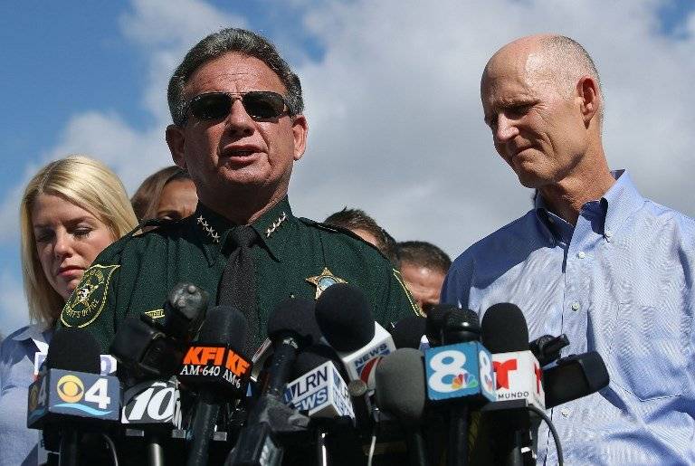 Scott Israel y Rick Scott
