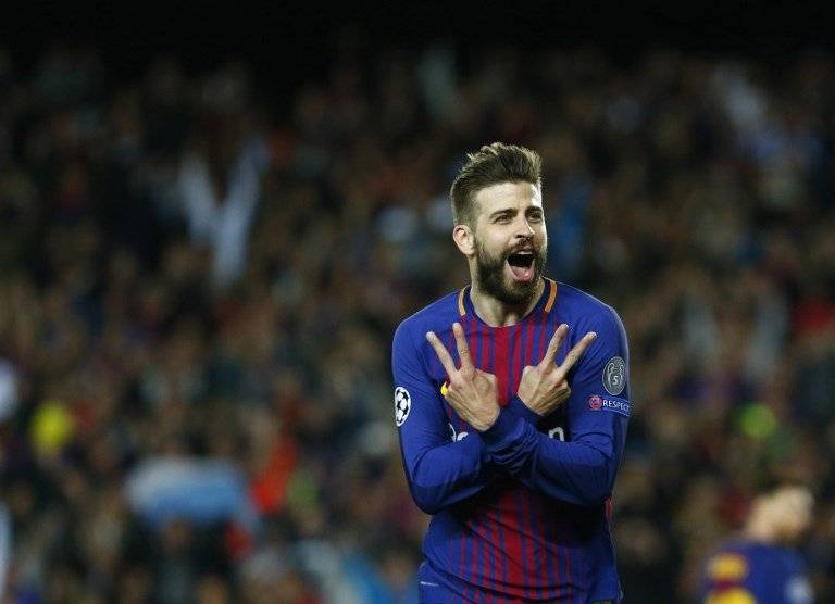 Gerard Piqué celebra un gol contra la Roma