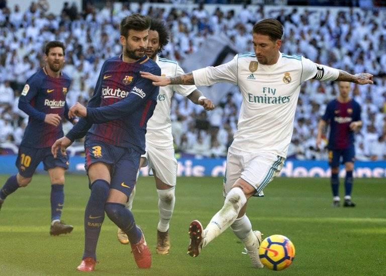 Gerard Piqué y Sergio Ramos en un clásico