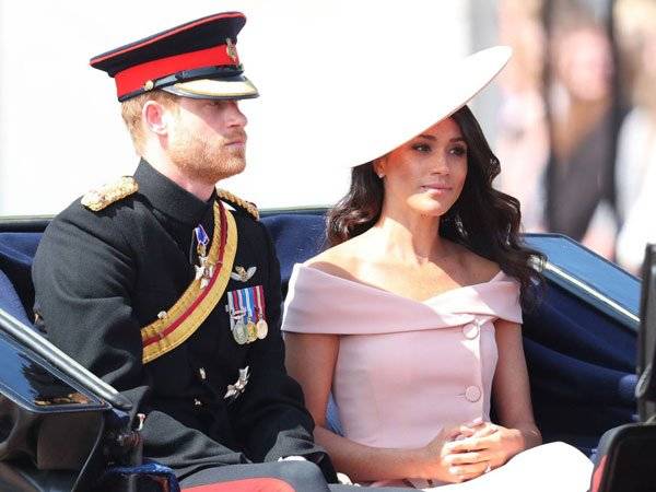 Isabel II Meghan Markle Reina