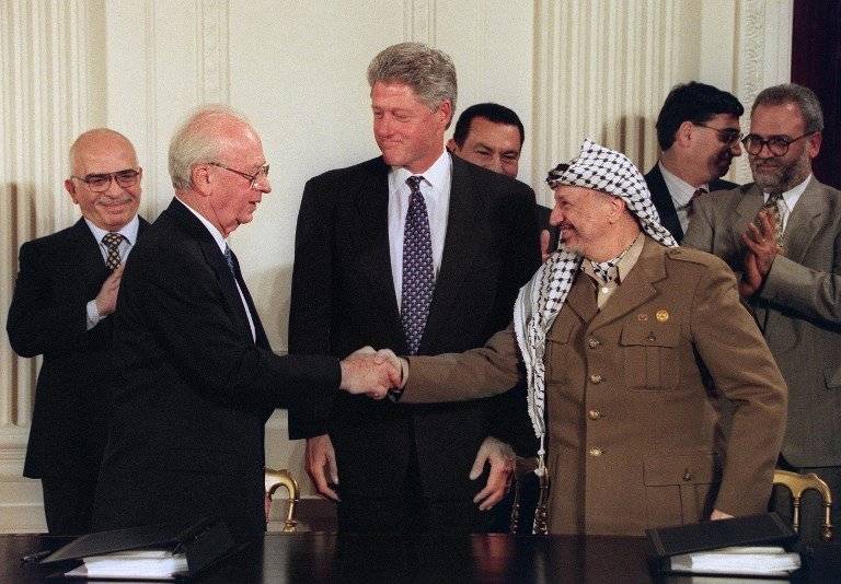 Isaac Rabin y Yaser Arafat