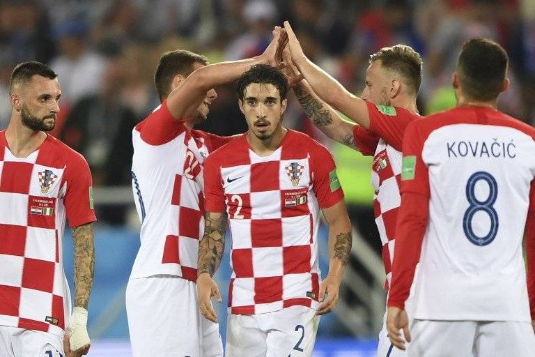 Los jugadores croatas celebran tras finalizado el partido