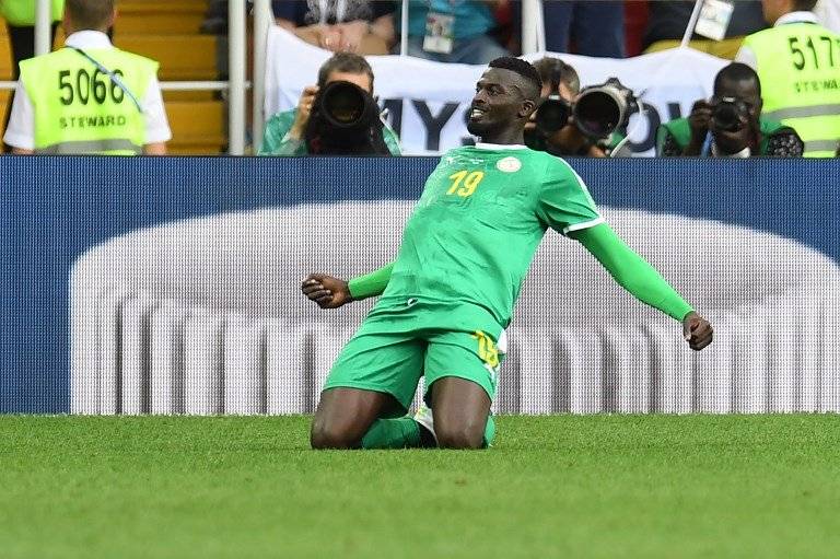 Niang celebra su anotación ante Polonia