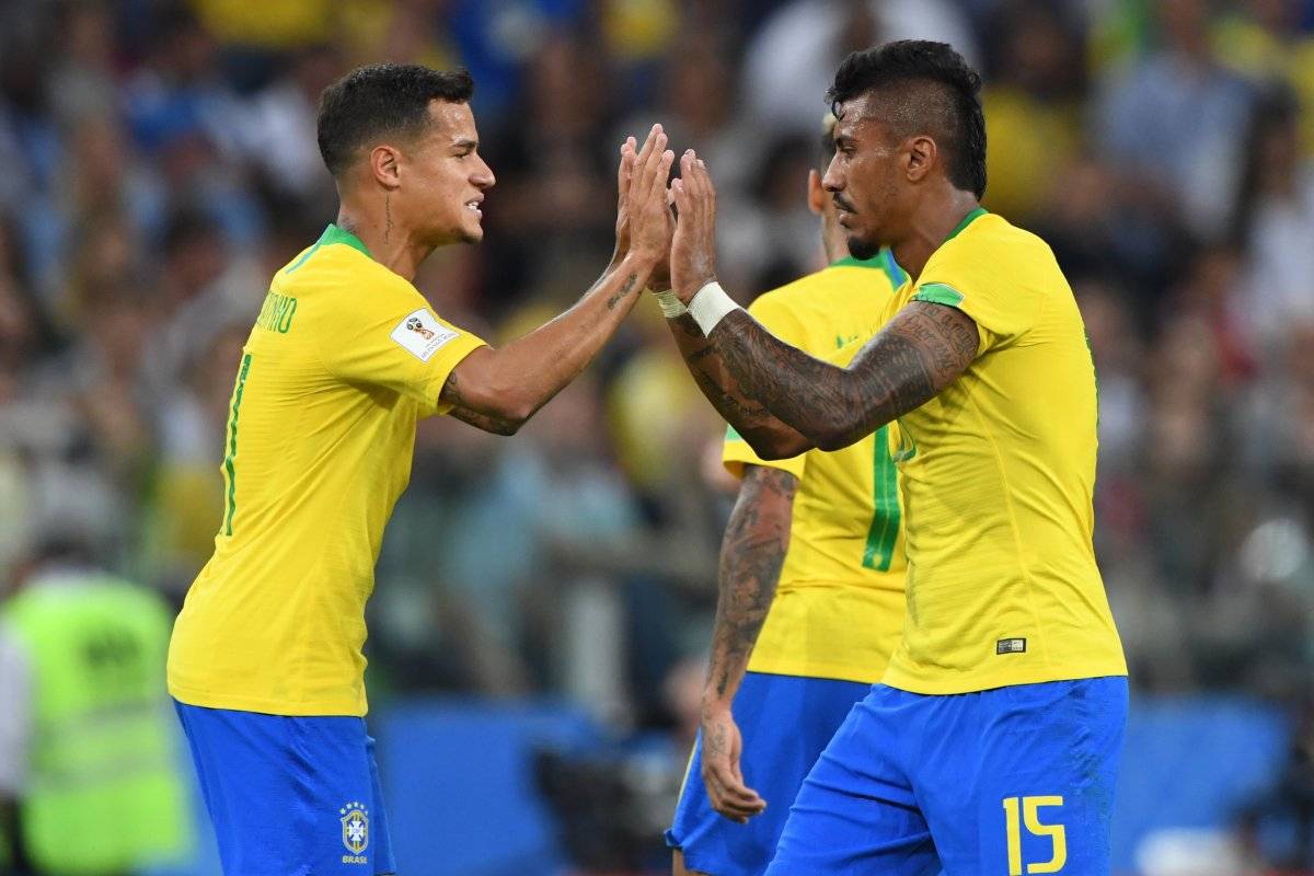 Paulinho festeja con Coutinho