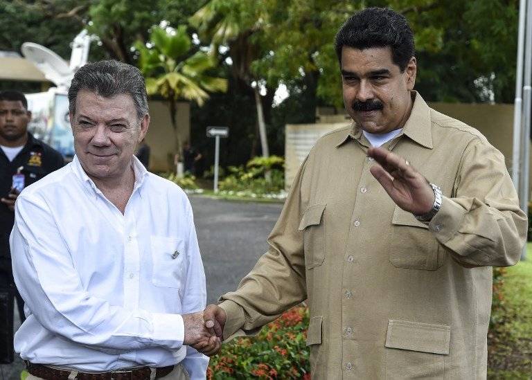 Juan Manuel Santos y Nicolás Maduro