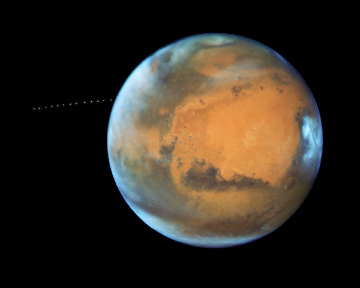 103649540nasahubblemartianmoonorbitingmars-65cda6faa89f88d9acc68bcf44922a9c.jpg
