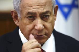 El primer ministro israelí Benjamin Netanyahu participa en la reunión semanal con su gabinete en Jerusalén, el domingo 13 de enero de 2019. (AP Foto/Ariel Schalit, Pool)