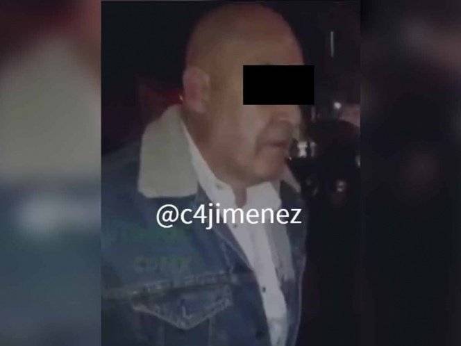 Policía detenido