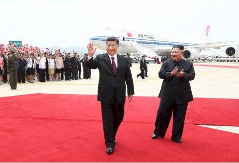 Xi