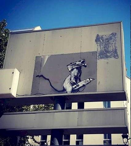 banksy1-de46b614669045540811136d1de1f1a9.jpg