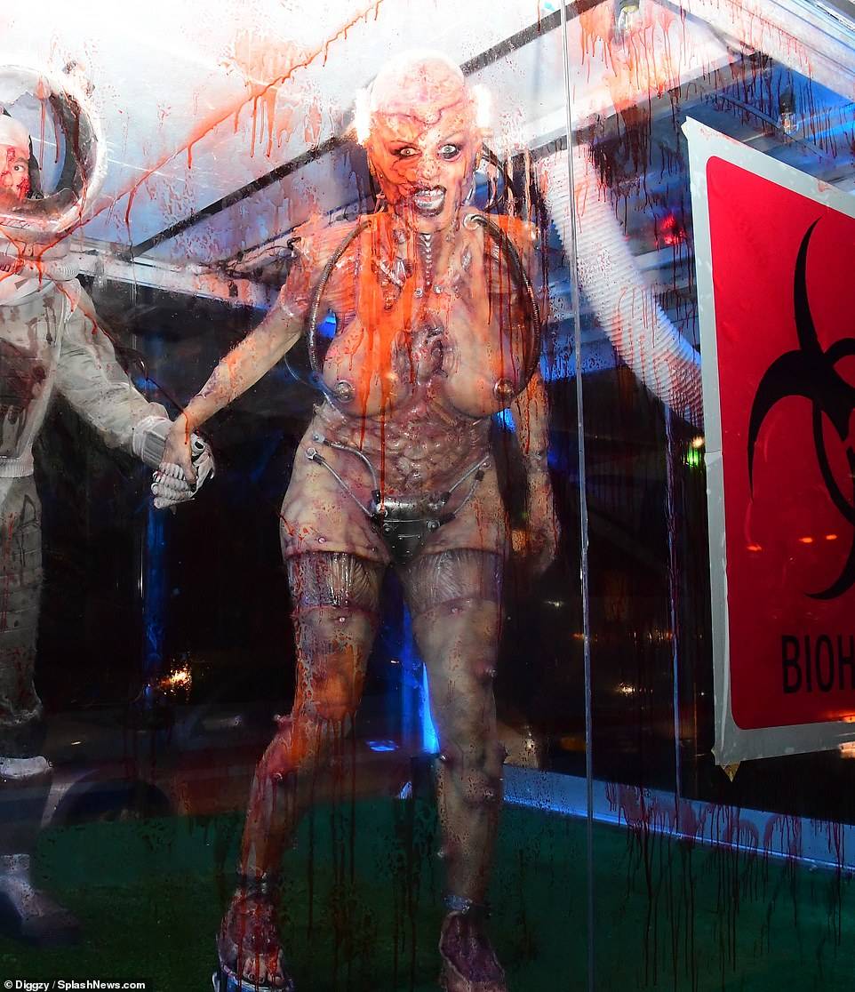 https://www.dailymail.co.uk/tvshowbiz/article-7638007/Heidi-Klum-bloody-gory-costume-20th-Annual-Halloween-Party-NYC.html