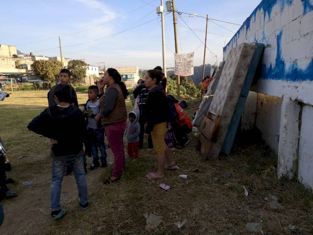 traslado de familias de Ciudad Peronia a albergue