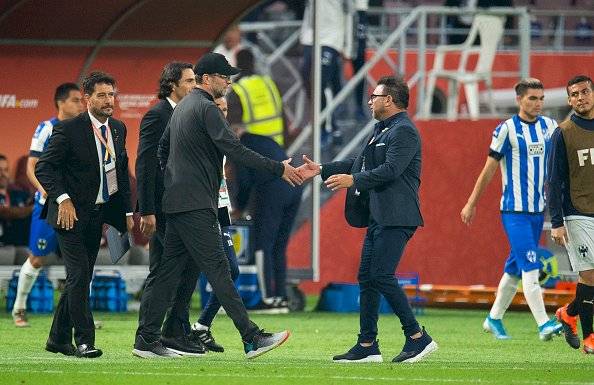 Jurgen Klopp y Antonio Mohamed