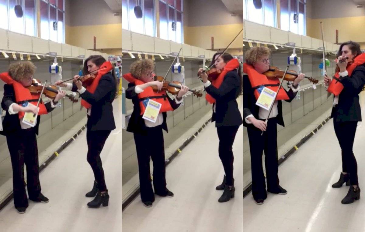 violinistas tocan canción de Titanic