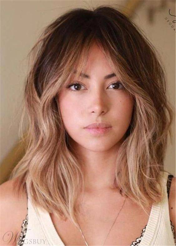 Cortes de cabello para mujeres de frente amplia flequillos para frente grande