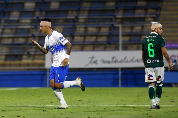 Valber Huerta (UC) y Gabriel Rojas /SW) terminaron el partido con vendajes