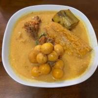 Sopa de iguana con caldo de calabaza y plátanos