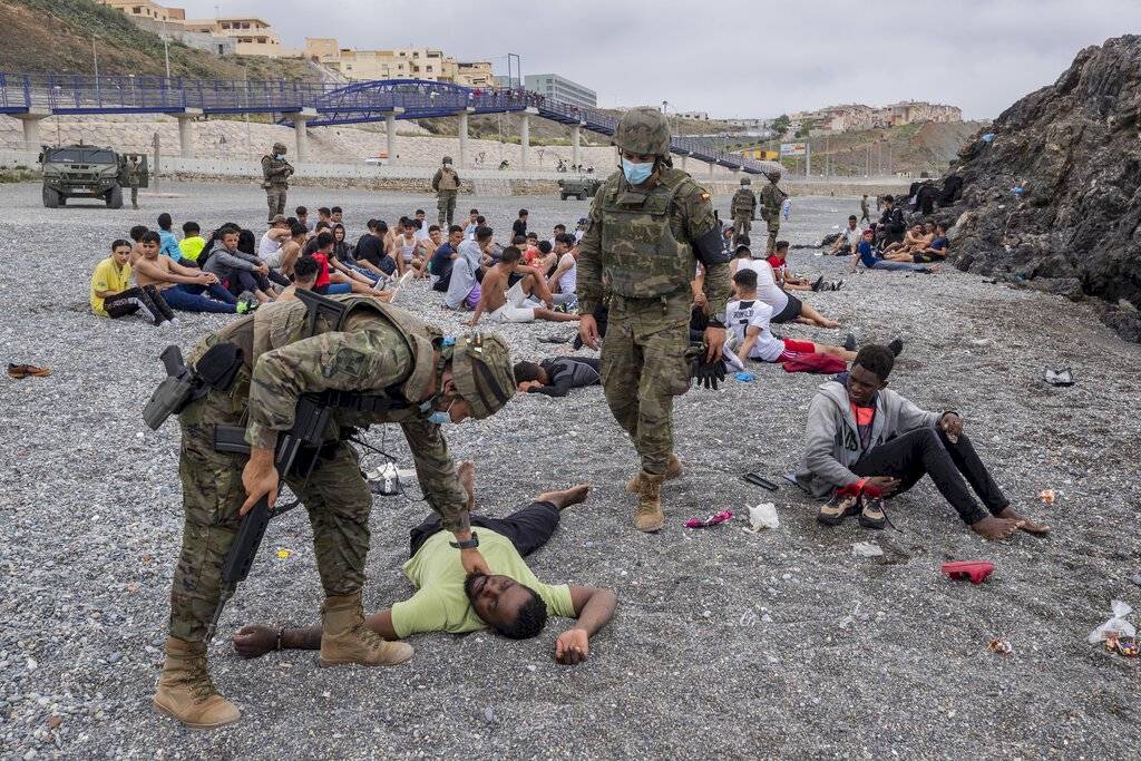 migrantes playa